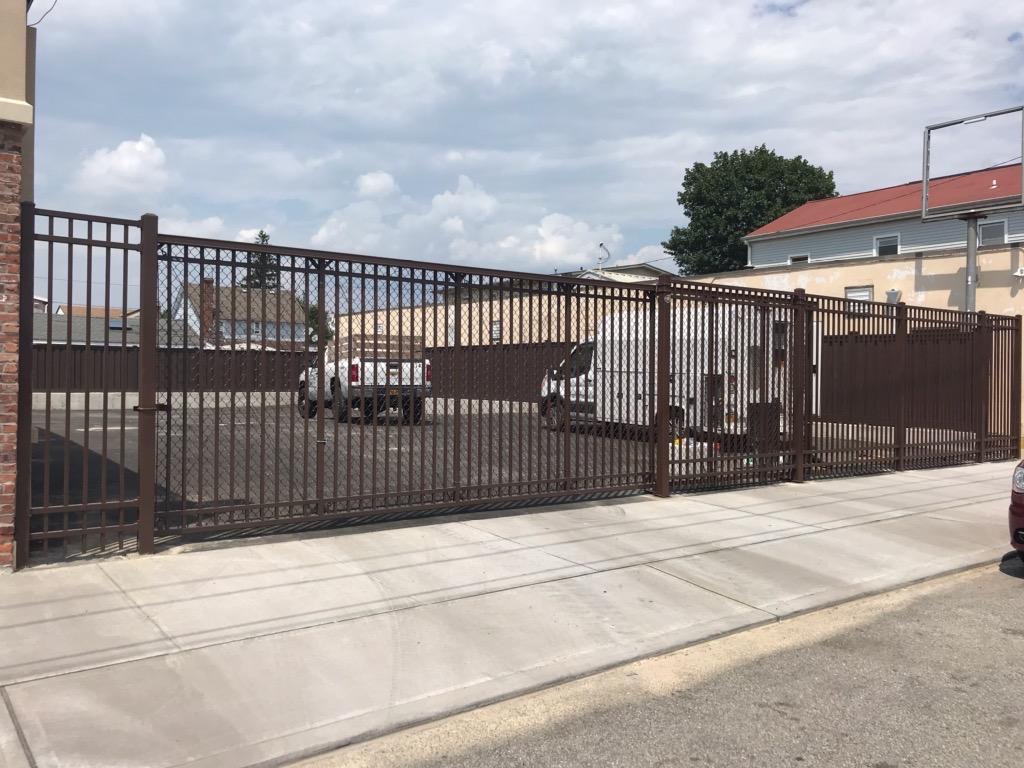 8ft high brown slide gate with motor