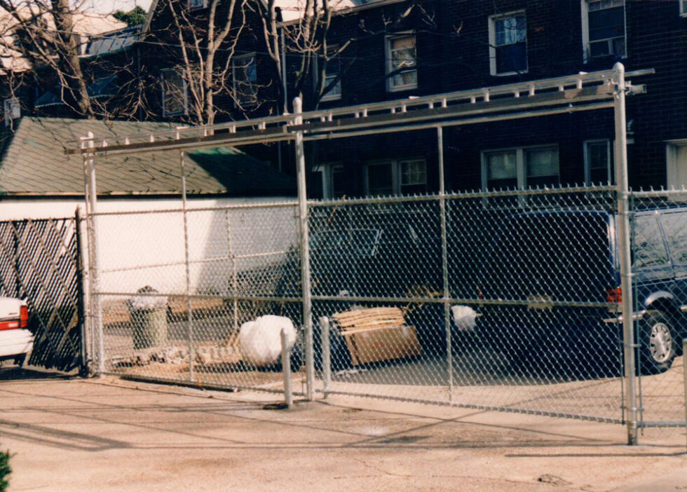 6ft high 400lb track slide gate with hedge inserts for residential chain link gate installation in NYC