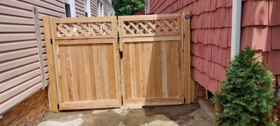 Double drive gates with lattice topper for elegant entryways in NYC