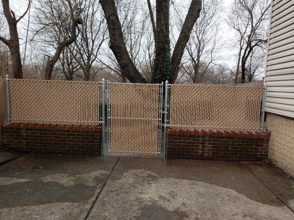 Custom Chain Link Fence with Beige PVT Inserts